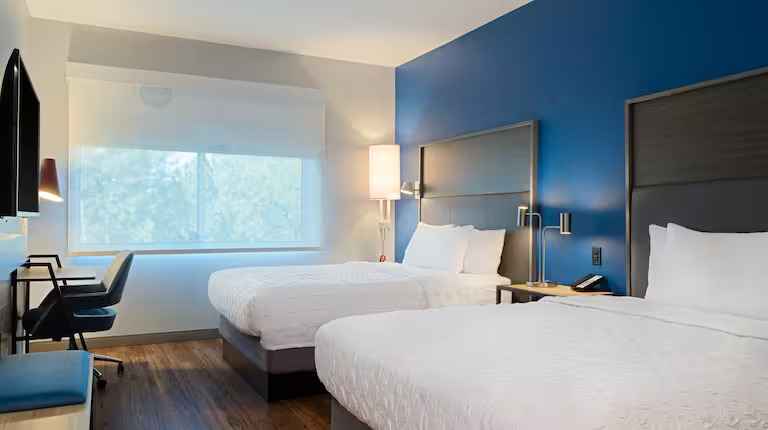 Tru by Hilton guest room with compact modern layout