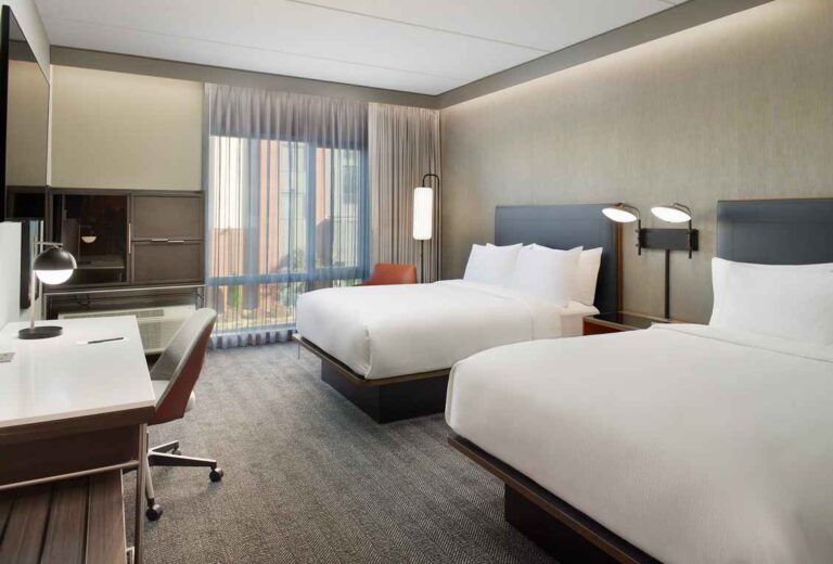Spacious suite at an extended stay hotel in Covington GA with a fully equipped kitchen and comfortable living area.